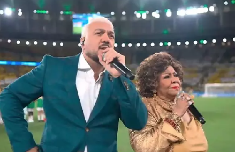 Alcione e Belo viram meme após cantarem Hino Nacional no Maracanã: "Era melhor deixar o samba morrer"