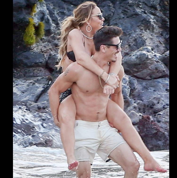 Um mês após separação, Mariah Carey é vista aos beijos com dançarino novinho