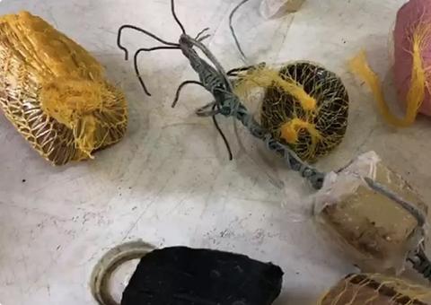 Detentos são flagrados 'pescando' pacotes com drogas e celulares em presídio