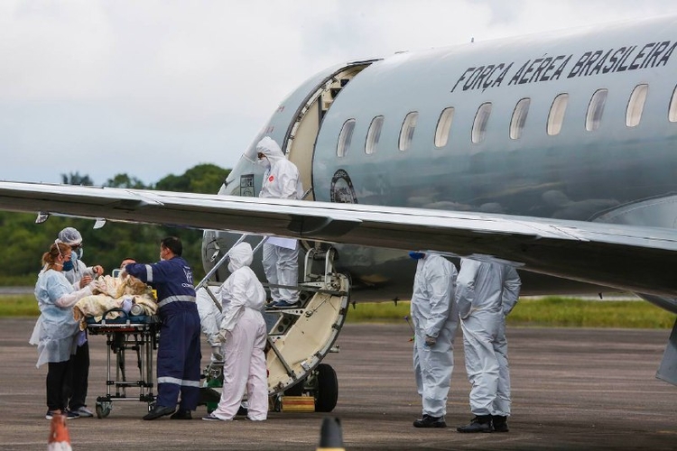 Avião da FAB faz a transferência dos pacientes (Foto: Divulgação/Secom)