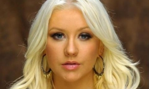 Aguilera aconselha Justin Bieber a se afastar da mídia