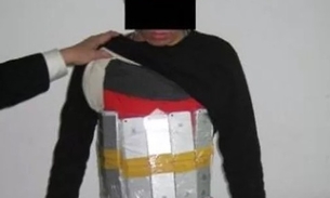 Chinês vira piada ao contrabandear 94 iphones presos ao corpo 