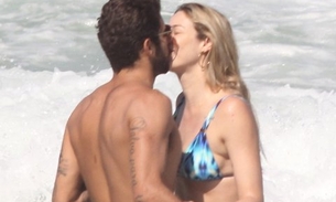 Após foto polêmica, Luana Piovani beija muito na praia