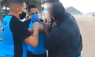 Guarda Municipal usa arma de eletrochoque em homem sem máscara em praia 