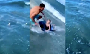 Policial salva criança de ataque de tubarão; Veja vídeo 