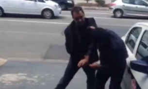  Policial espanca comerciante após discussão e câmeras de segurança registram tudo