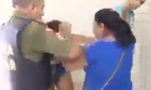 Mãe bate em filha presa após assaltar ônibus com namorado