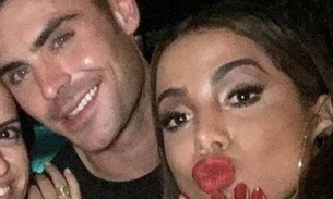 Anitta e Zac Efron trocam beijos em festa 