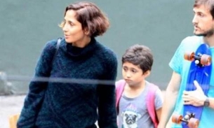 Após tragédia, Camila Pitanga muda visual e aproveita férias em família  