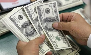Dólar passa de R$ 3,50, mas fecha abaixo de R$ 3,40 após três leilões do BC