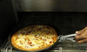 Assaltantes armados roubam pizzaria e exigem 'pizzas quentes'