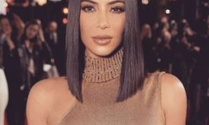 Kim Kardashian rebate críticas após fotos de bumbum descomunal na praia