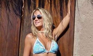Aos 40, Ticiane Pinheiro mostra barriga sarada de biquíni 