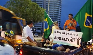 Manauaras fecham Ponta Negra em apoio a greve dos caminhoneiros 