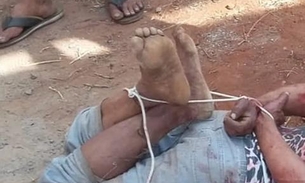 Homem é amarrado por populares após tentar sequestrar criança e mãe gritar por socorro
