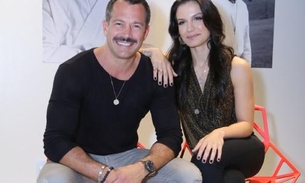 Malvino Salvador e Kyra Gracie trocam beijos em inauguração de academia no Rio