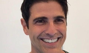 Com fama de gay, Gianecchini aparece com mulher misteriosa no colo e detalhe no corpo chama atenção