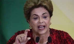 'Bolsonaro responderá na Justiça pela leviandade', afirma Dilma