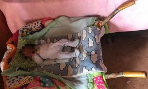 Sem dinheiro, família improvisa berço em carrinho de mão