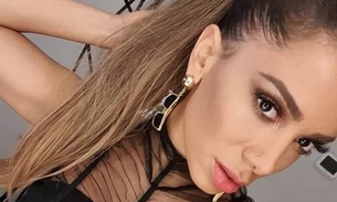 Com biquíni que não dá conta do recado, Anitta aparece dançando antes de show