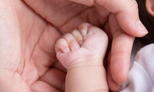 Baleada na cabeça, sobrevivente de chacina dá luz à menina em Manaus