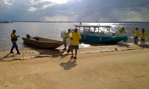 Em Manaus, grupo escoteiro faz coleta de resíduos plásticos na Ponta Negra