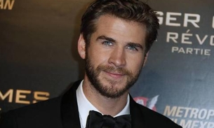 Liam Hemsworth supera Miley Cyrus e é visto aos beijos com modelo australiana