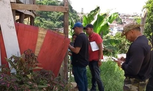 Famílias vivendo em área com risco de desabamento são multadas em Manaus 