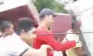 Populares saqueiam 399 TVs após acidente com carreta que saiu de Manaus; veja vídeo