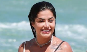 De biquíni minúsculo, Aline Riscado exibe corpão em praia do RJ  