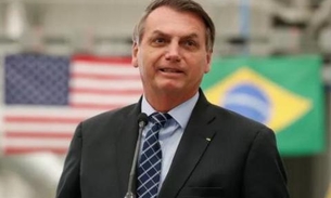 Doze membros da comitiva de Bolsonaro em viagem aos EUA testam positivo para coronavírus