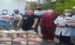 Após salários atrasados, maqueiros do hospital 28 de Agosto recebem cestas básicas de colegas enfermeiros