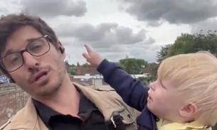 Repórter da BandNews faz entrada ao vivo com filho no colo e passa perrengue; vídeo