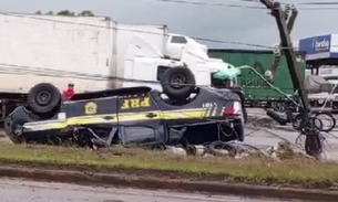 Vídeo: Cabos de alta tensão ficam presos em viatura da PRF após capotamento