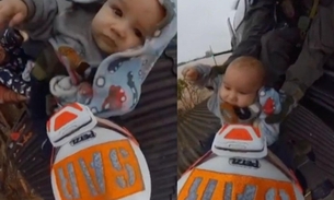 Vídeo mostra bebê sendo resgatado pelo telhado de casa