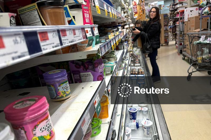 Crescimento do PIB dos EUA no 4º tri é revisado para baixo a 0,5%