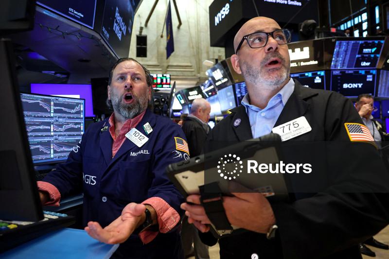 Wall St abre em alta com foco no Fed