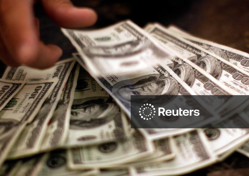 Dólar oscila perto da estabilidade ante o real após novo corte de juros